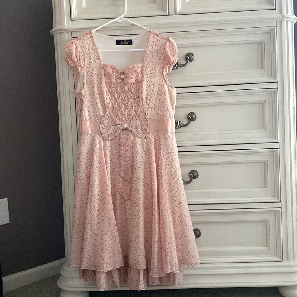 Beautiful pink dress with golden dots.